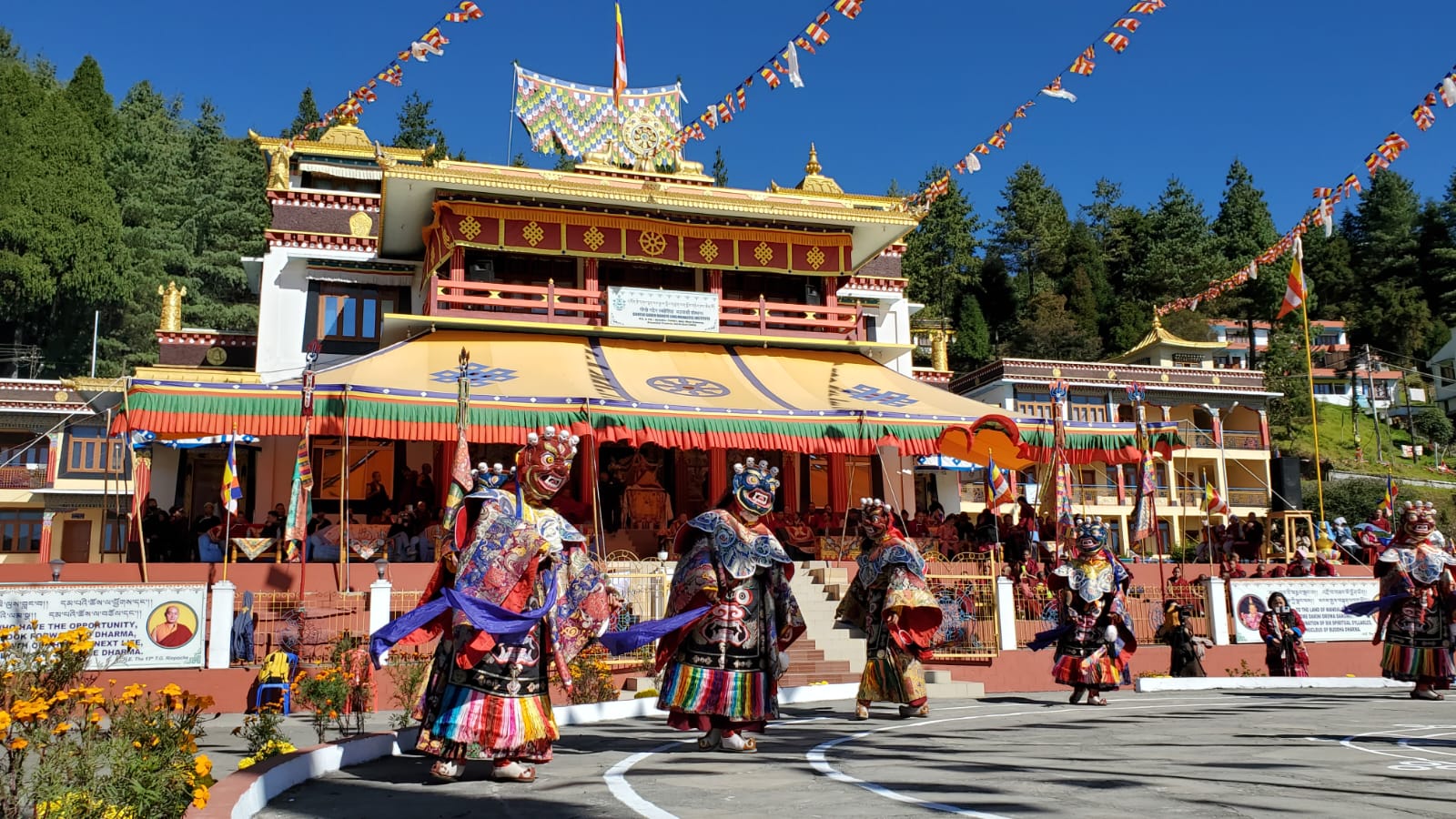Cham mask dance performed in front of a Buddhist monastery during Losar Festival, Tawang, Arunachal Pradesh